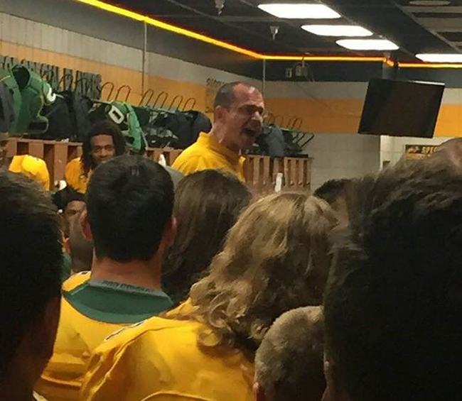 Ben Newman speaks to the NDSU Football team in the locker room postgame