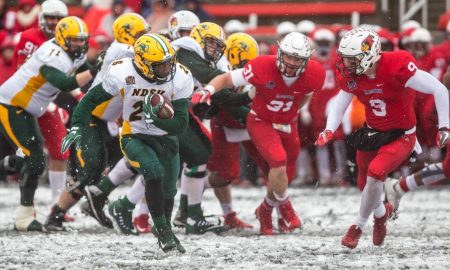 ty-brooks-rushing-in-game-with-snow-on-ground